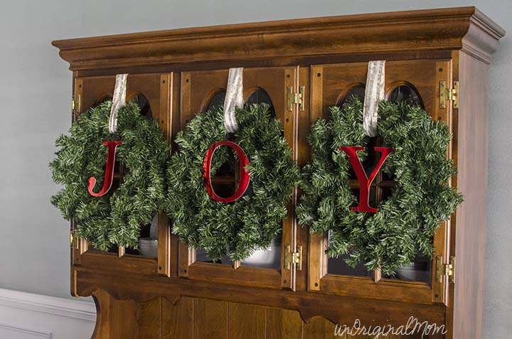 Simple, quick, and easy way to decorate your china cabinet for Christmas!