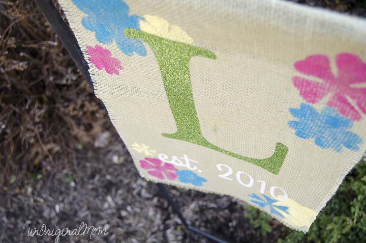 A "rustic glam" burlap garden flag with glitter heat transfer vinyl!