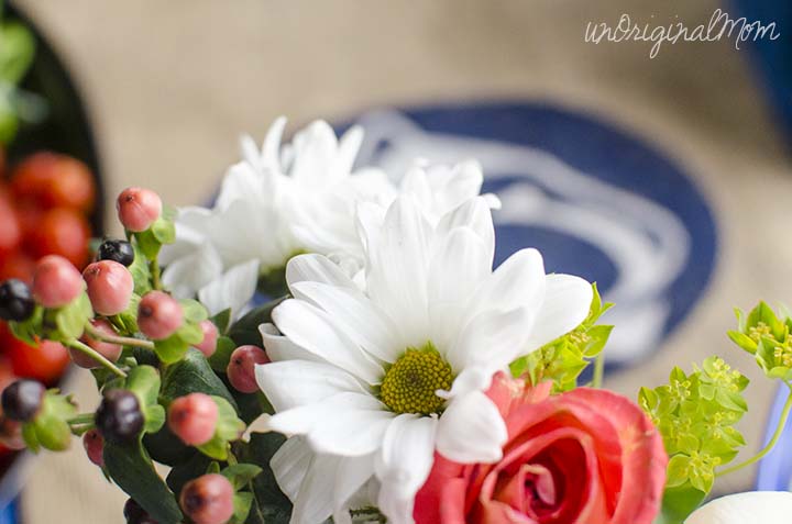 Fresh flowers from grocery store bouquets are an affordable way to pretty-up a table for any type of gathering!