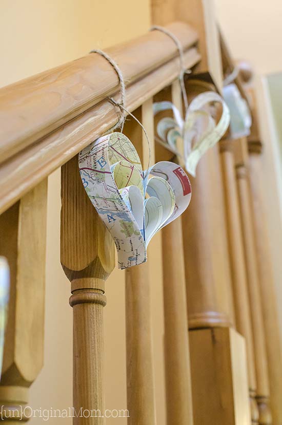 Easy DIY paper strip hearts made out of maps.  So great for a travel themed bridal shower or baby shower
