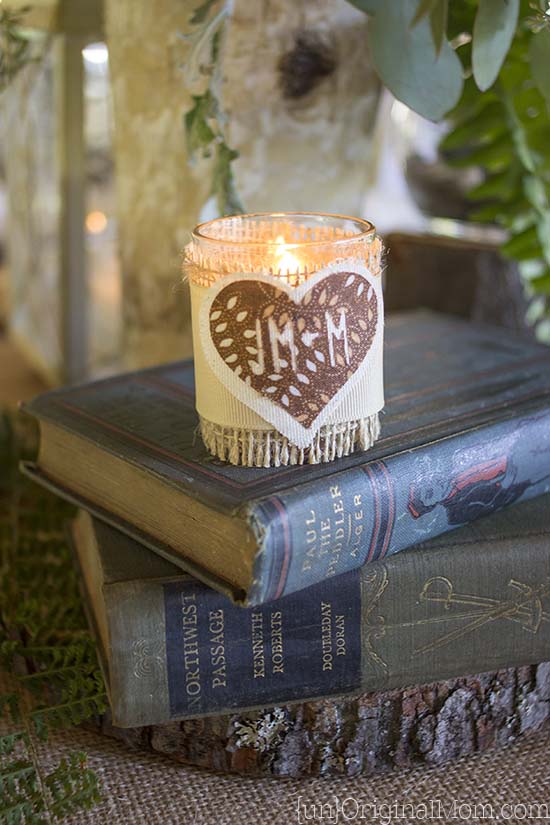 Step by step tutorial to create burlap wrapped votives with iron on fabric accents - perfect for a woodland wedding or shower