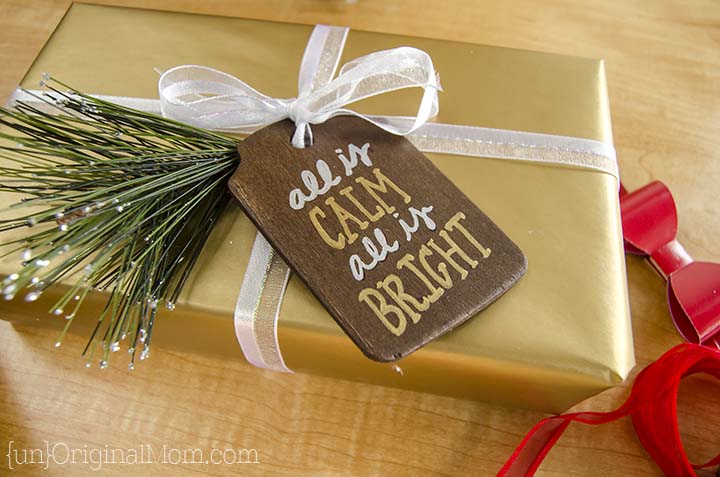 Rustic stained wood gift tags with metallic sharpie paint pens. A beautiful addition to holiday wrapping!