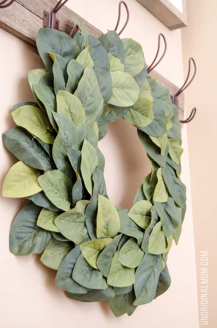 Great tutorial to make your own farmhouse style Magnolia Wreath for under $15! So much better than paying $100 for a store bought one. Love this Magnolia Market knockoff!