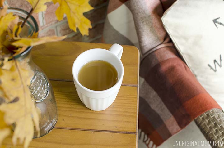 A beautiful and cozy fall front porch - so comfortable and inviting! Plus a few tips on how to decorate your own fall front porch.