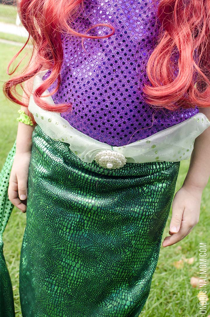 Adorable DIY Little Mermaid and Flounder costumes! The Ariel costume has a repositionable fin, and the no-sew toddler Flounder costume is super easy to make out of a yellow hoodie.