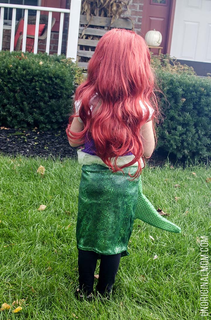 Adorable DIY Little Mermaid and Flounder costumes! The Ariel costume has a repositionable fin, and the no-sew toddler Flounder costume is super easy to make out of a yellow hoodie.