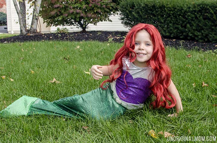 Adorable DIY Little Mermaid and Flounder costumes! The Ariel costume has a repositionable fin, and the no-sew toddler Flounder costume is super easy to make out of a yellow hoodie.