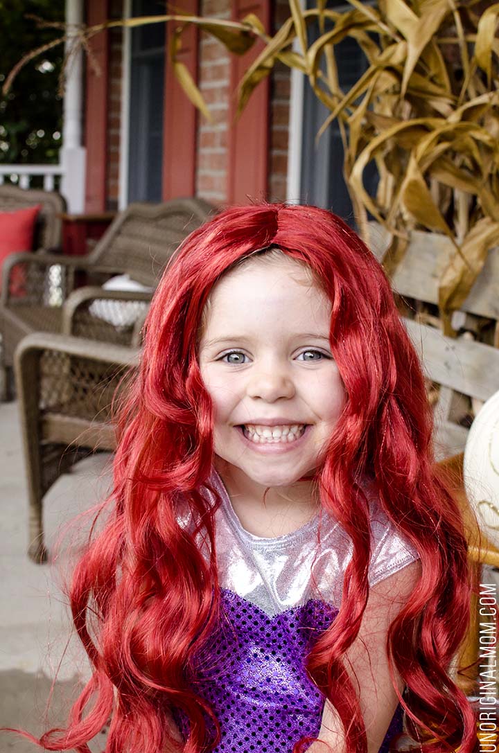 Adorable DIY Little Mermaid and Flounder costumes! The Ariel costume has a repositionable fin, and the no-sew toddler Flounder costume is super easy to make out of a yellow hoodie.