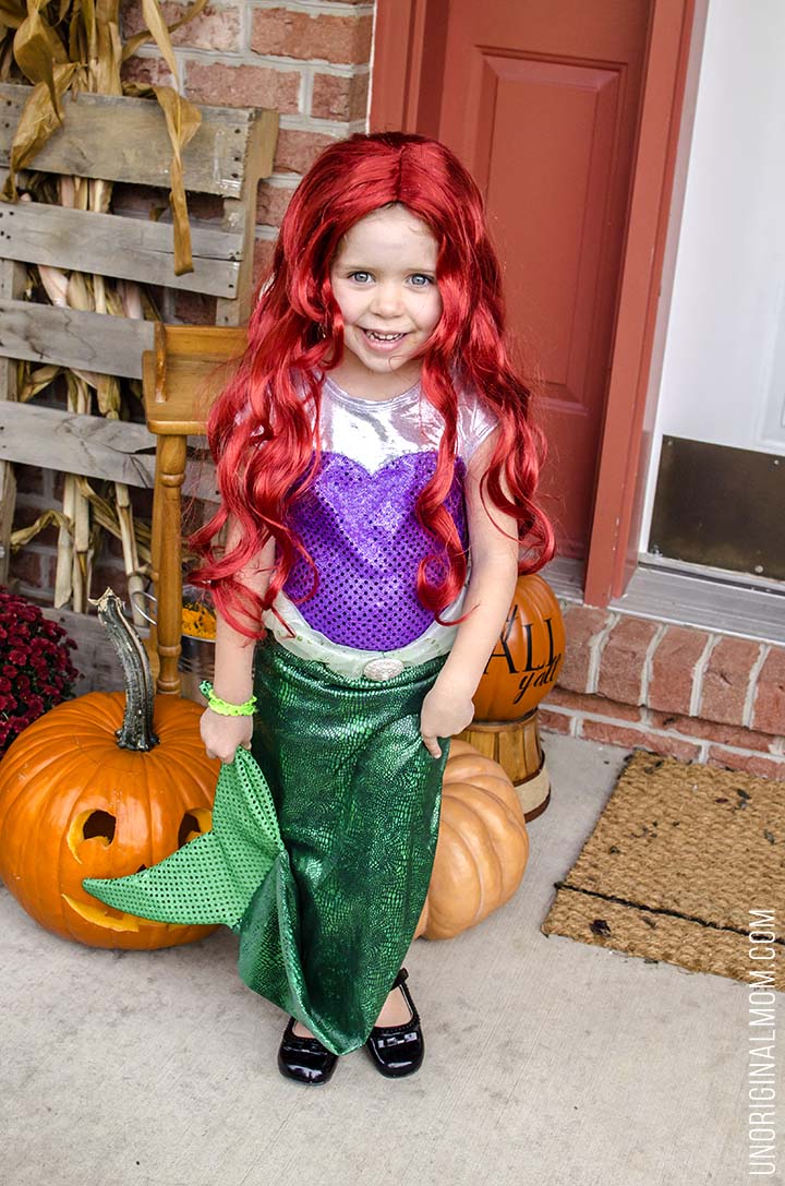 Adorable DIY Little Mermaid and Flounder costumes! The Ariel costume has a repositionable fin, and the no-sew toddler Flounder costume is super easy to make out of a yellow hoodie.