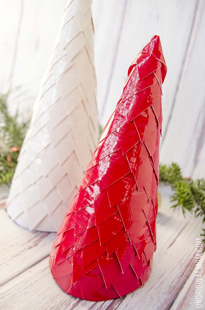 Make Christmas trees out of cereal boxes and duct tape! Super cheap Christmas decor, easy, and so pretty!