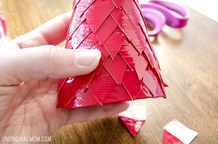 Make Christmas trees out of cereal boxes and duct tape! Super cheap Christmas decor, easy, and so pretty!