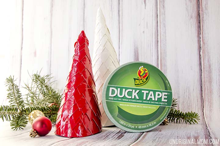 Make Christmas trees out of cereal boxes and duct tape! Super cheap Christmas decor, easy, and so pretty!