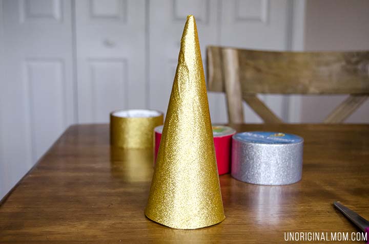 Make Christmas trees out of cereal boxes and duct tape! Super cheap Christmas decor, easy, and so pretty!