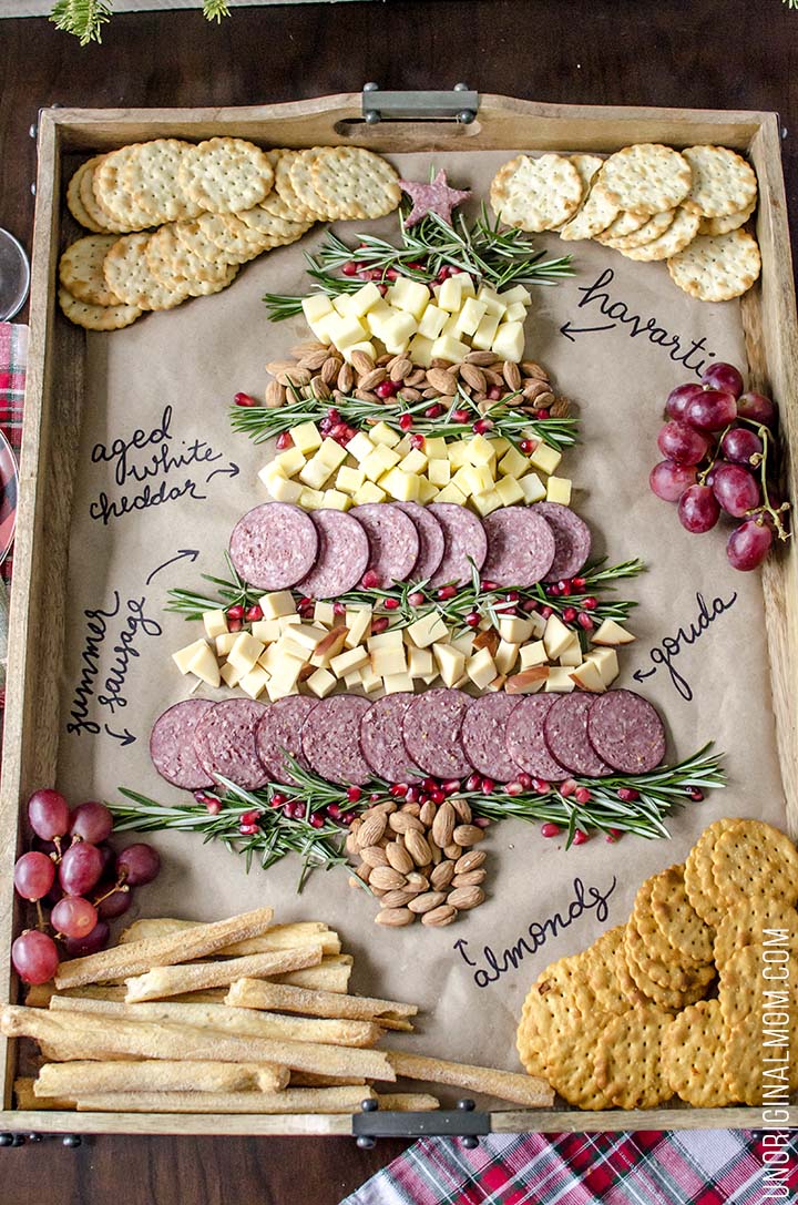 Create a Christmas tree cheeseboard for your holiday entertaining - it's so easy! What a beautiful way to do a holiday cheese tray!