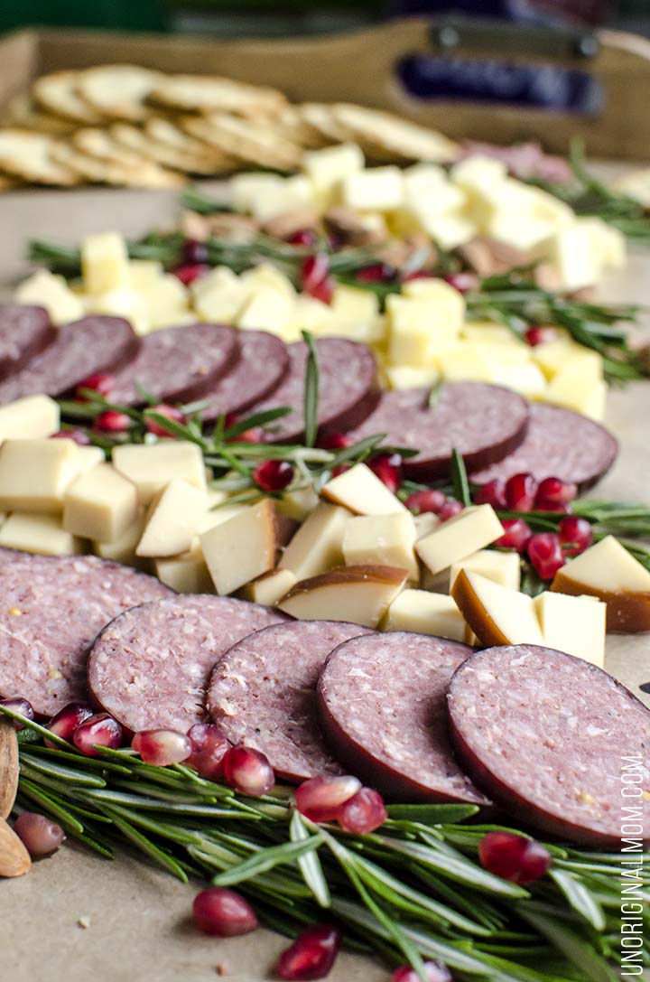 Create a Christmas tree cheeseboard for your holiday entertaining - it's so easy! What a beautiful way to do a holiday cheese tray!