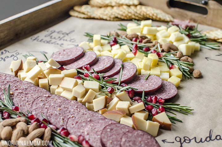Create a Christmas tree cheeseboard for your holiday entertaining - it's so easy! What a beautiful way to do a holiday cheese tray!