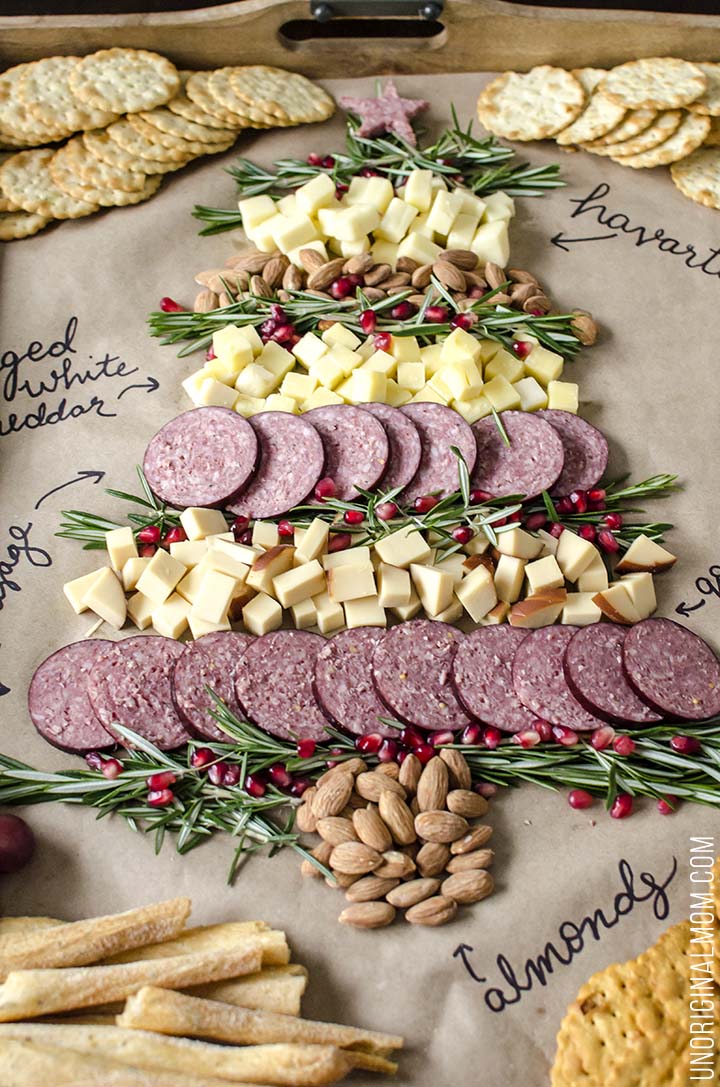 Create a Christmas tree cheeseboard for your holiday entertaining - it's so easy! What a beautiful way to do a holiday cheese tray!