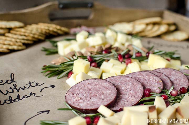 Create a Christmas tree cheeseboard for your holiday entertaining - it's so easy! What a beautiful way to do a holiday cheese tray!