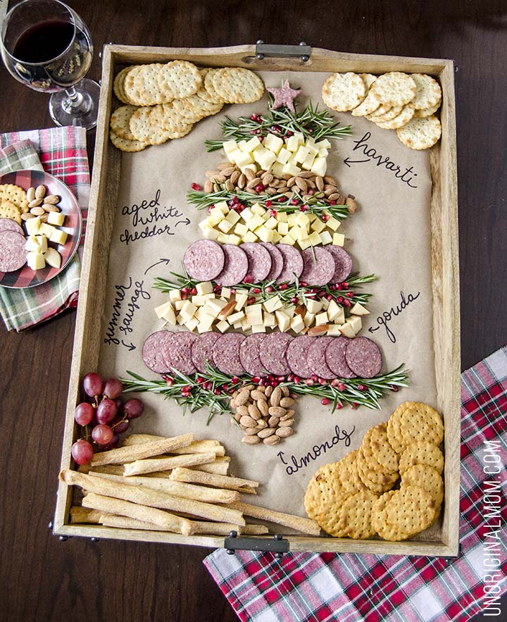 Create a Christmas tree cheeseboard for your holiday entertaining - it's so easy! What a beautiful way to do a holiday cheese tray!