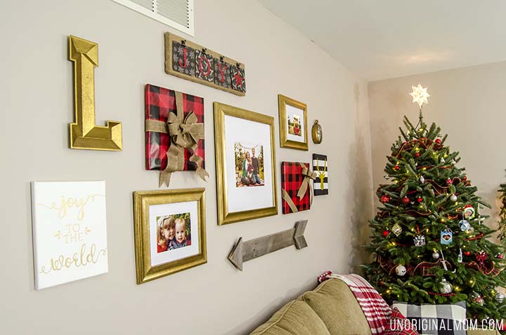 How to decorate a gallery wall for Christmas - great tips! I love the frames wrapped to look like gifts!