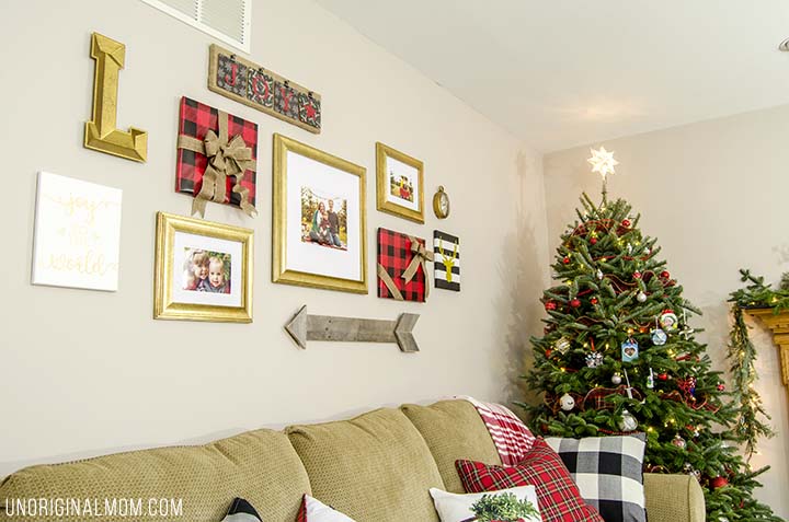 How to decorate a gallery wall for Christmas - great tips! I love the frames wrapped to look like gifts!