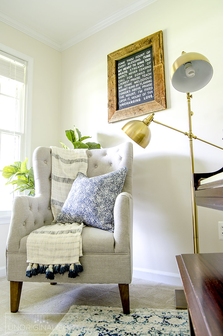 I love this pretty reading nook that's part of an industrial farmhouse music room/office! Plus a neat DIY farmhouse hymn sign. | industrial farmhouse | farmhouse hymn art | come thou fount sign | silhouette farmhouse wall art | one room challenge