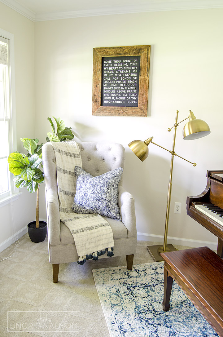 I love this pretty reading nook that's part of an industrial farmhouse music room/office! Plus a neat DIY farmhouse hymn sign. | industrial farmhouse | farmhouse hymn art | come thou fount sign | silhouette farmhouse wall art | one room challenge