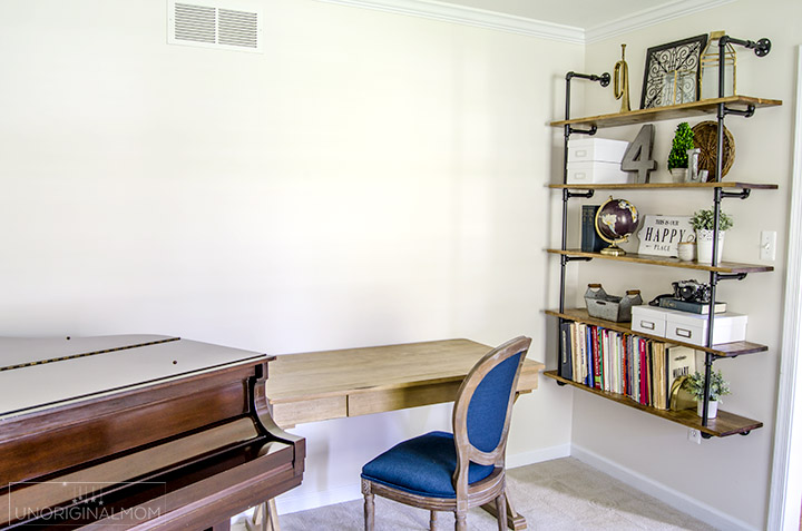 Pipe shelves for an industrial farmhouse office - such a great(and affordable) way to add a lot of style and character to a room! | industrial farmhouse pipe shelves | pipe shelving | fixer upper shelves | one room challenge