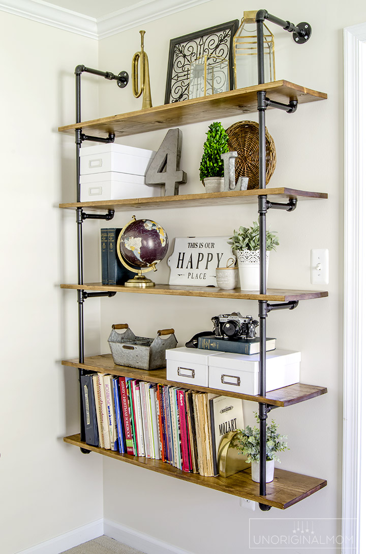 Pipe shelves for an industrial farmhouse office - such a great(and affordable) way to add a lot of style and character to a room! | industrial farmhouse pipe shelves | pipe shelving | fixer upper shelves | one room challenge