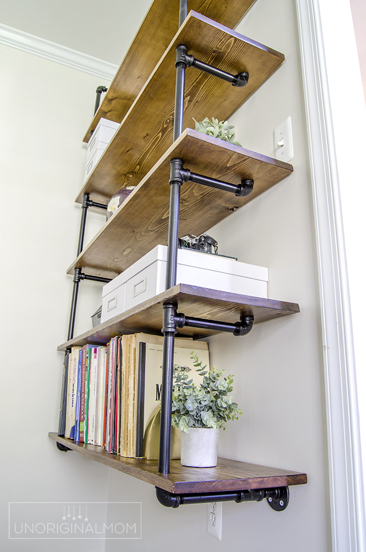 Pipe shelves for an industrial farmhouse office - such a great(and affordable) way to add a lot of style and character to a room! | industrial farmhouse pipe shelves | pipe shelving | fixer upper shelves | one room challenge