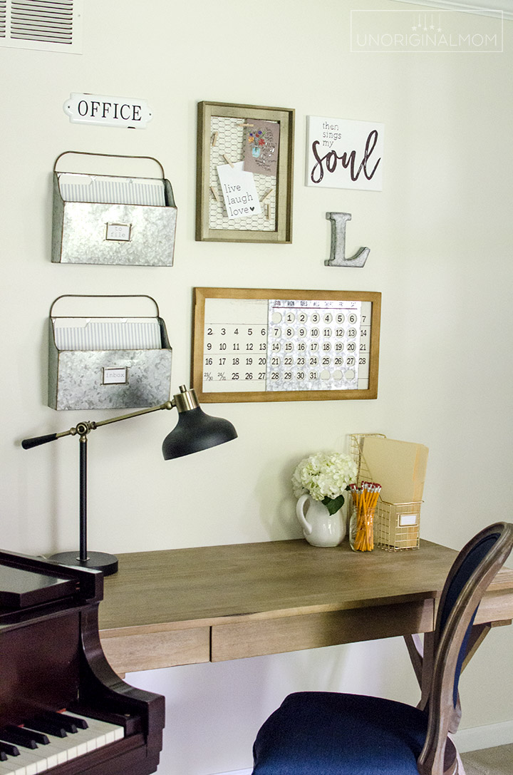 Beautiful Fixer Upper style industrial farmhouse office and music room makeover - includes pipe shelves, an office gallery wall, and lots of DIY farmhouse wall art! | One Room Challenge