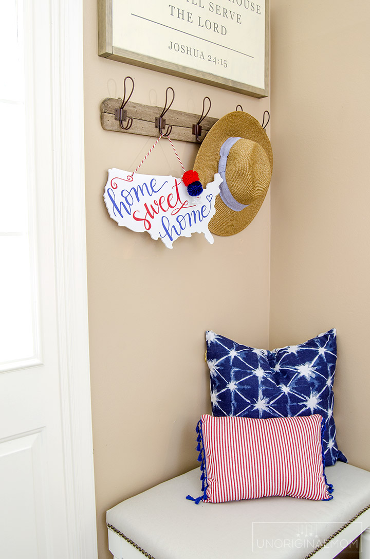 "Home Sweet Home" patriotic door hanger - perfect decor for the 4th of July! There's a free Silhouette cut file, too! | 4th of July | Patriotic decor | red white and blue decor | silhouette cut file | patriotic ideas with vinyl