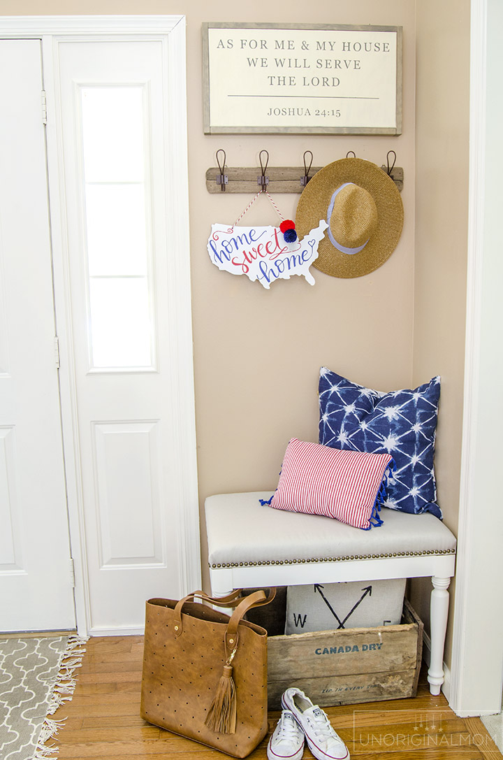 "Home Sweet Home" patriotic door hanger - perfect decor for the 4th of July! There's a free Silhouette cut file, too! | 4th of July | Patriotic decor | red white and blue decor | silhouette cut file | patriotic ideas with vinyl