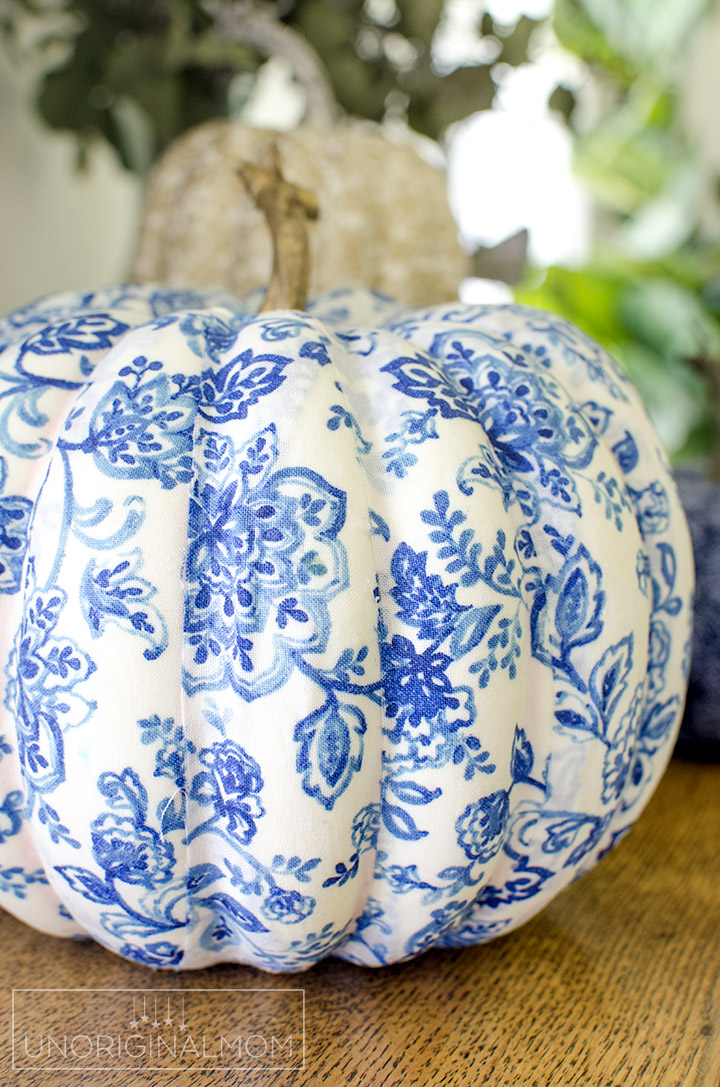 Create beautiful pumpkins for fall decor by covering them with fabric and mod podge. Perfect for any style of fall decor! | diy fabric covered pumpkins | fabric pumpkins | neutral fall decor | blue fall decor | mod podge fabric pumpkins | 
