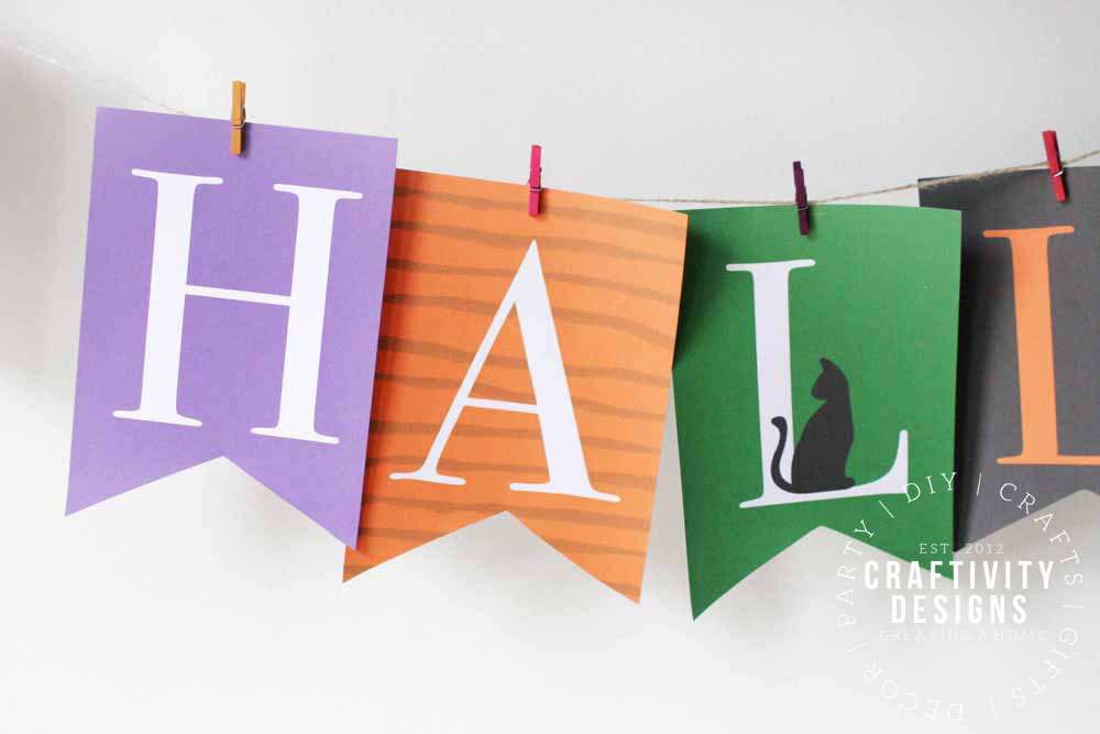 Super cute free printable Happy Halloween banner - perfect for Halloween parties! #halloween #printable #happyhalloween