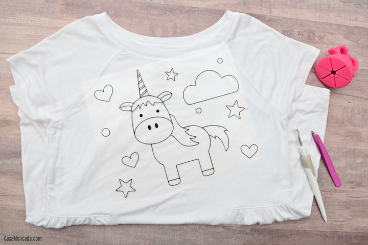 Make your own unicorn coloring shirt for kids with heat transfer vinyl and your Silhouette or Cricut! Super fun for party favors, or just because!