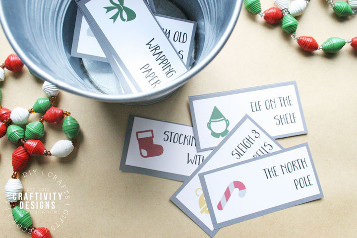 This free printable christmas charades game is an easy christmas game for christmas parties, or just to play at home with the family! #christmasgames #freeprintable #charades