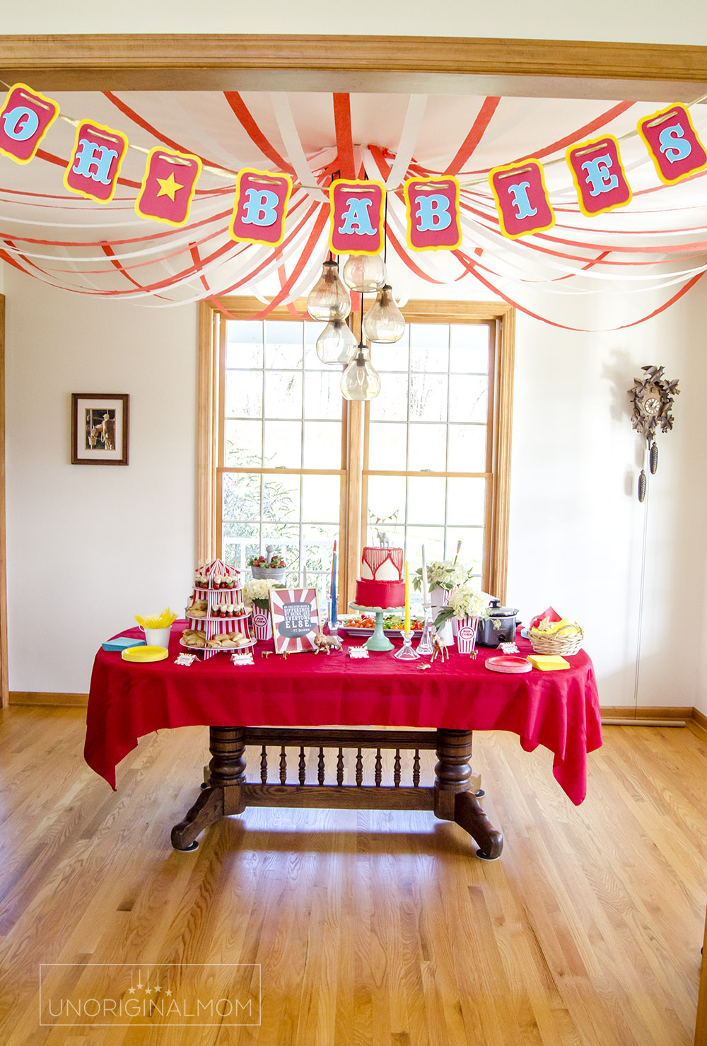 Circus Baby Shower ideas - create a "big top" look over the table with crepe paper!