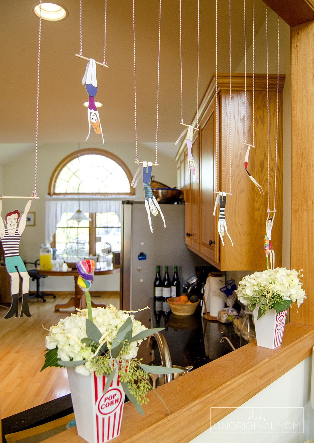 Circus Baby Shower ideas - hanging trapeze artists!