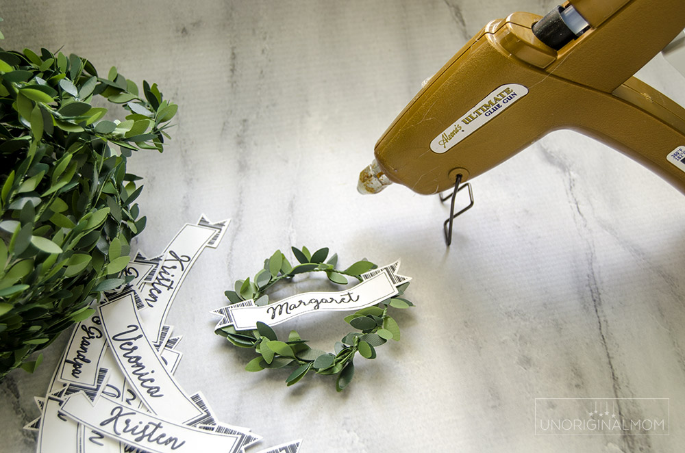 Use your Silhouette to sketch and cut these simple DIY Mini wreath gift tags for Christmas!