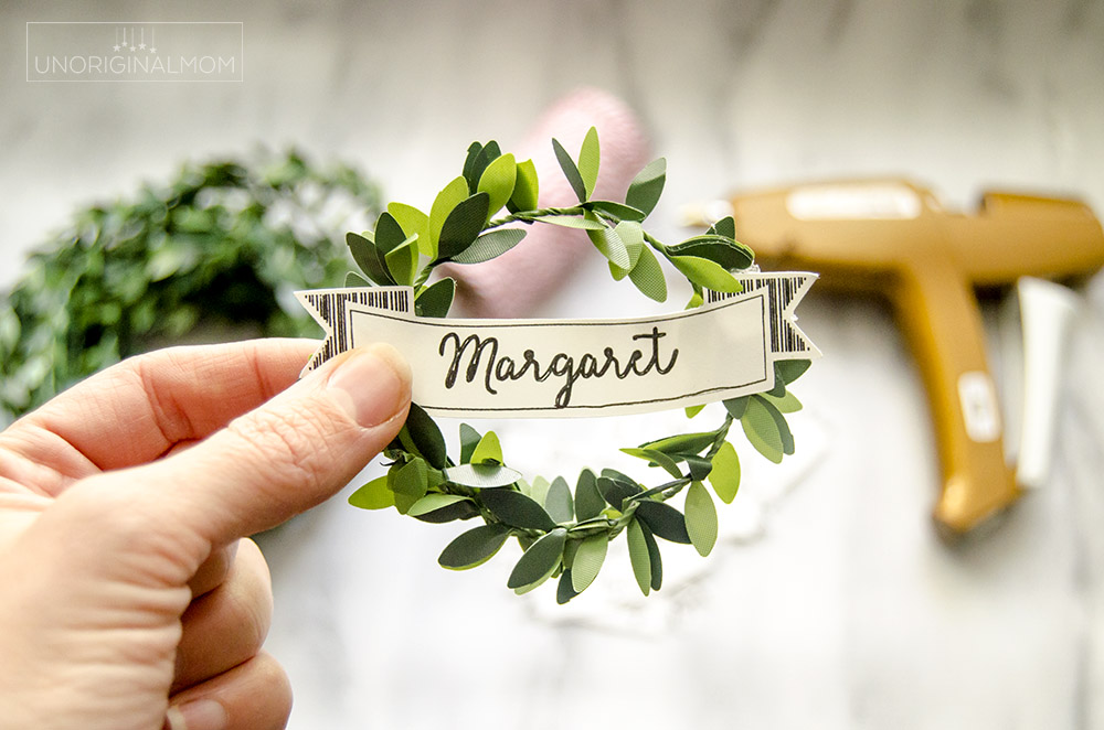 Use your Silhouette to sketch and cut these simple DIY Mini wreath gift tags for Christmas!