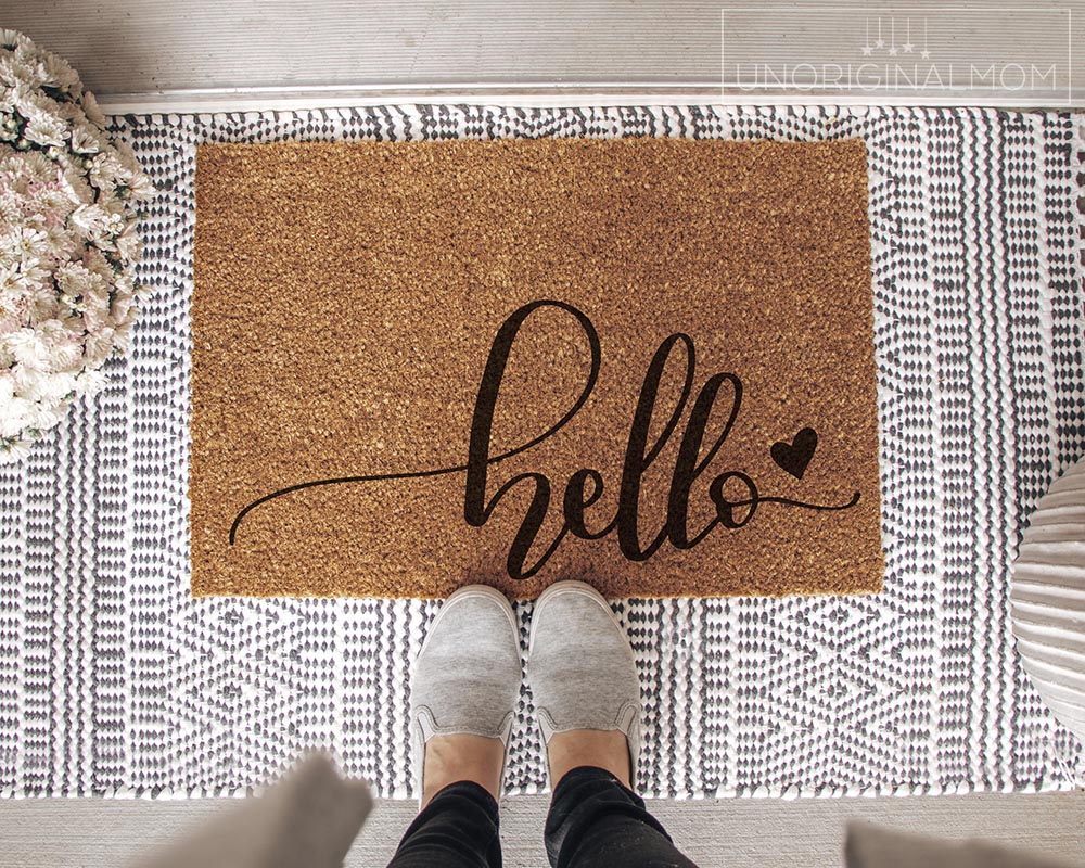 Home Sweet Home Welcome Mat At Custom Front Door of House., Stock image